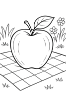 Apfel auf Picknickdecke